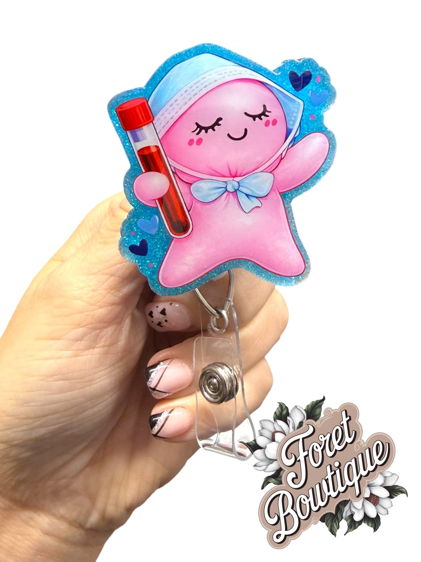 Pink Glove baby holding Tube