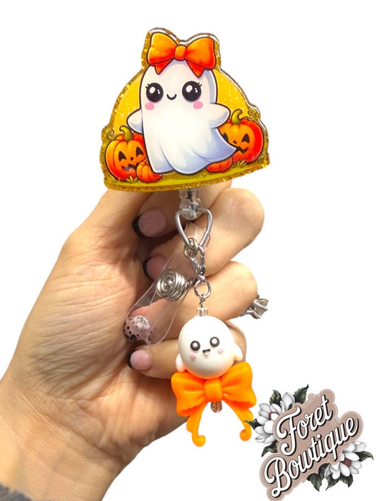 Ghost with pumpkins and charm